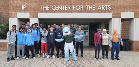 Campus Cleanup 2022 Students and staff with Danny the mascot in front of 1 P The Center of the Arts building. 