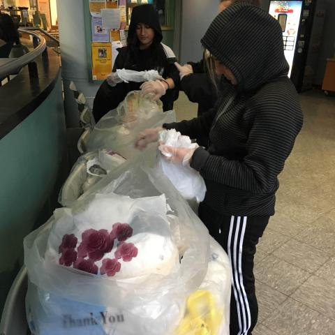 Bagdrive Students are counting the number of bags dropped off at our bag drive
