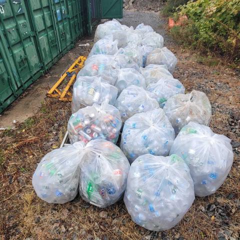 Bottle Drive Sorted bottles in clear bags are ready for pick up.